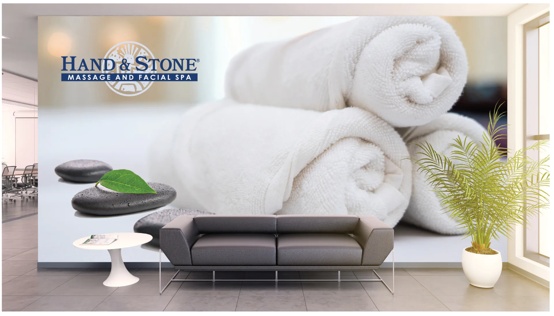 Hand and Stone vinyl branding application