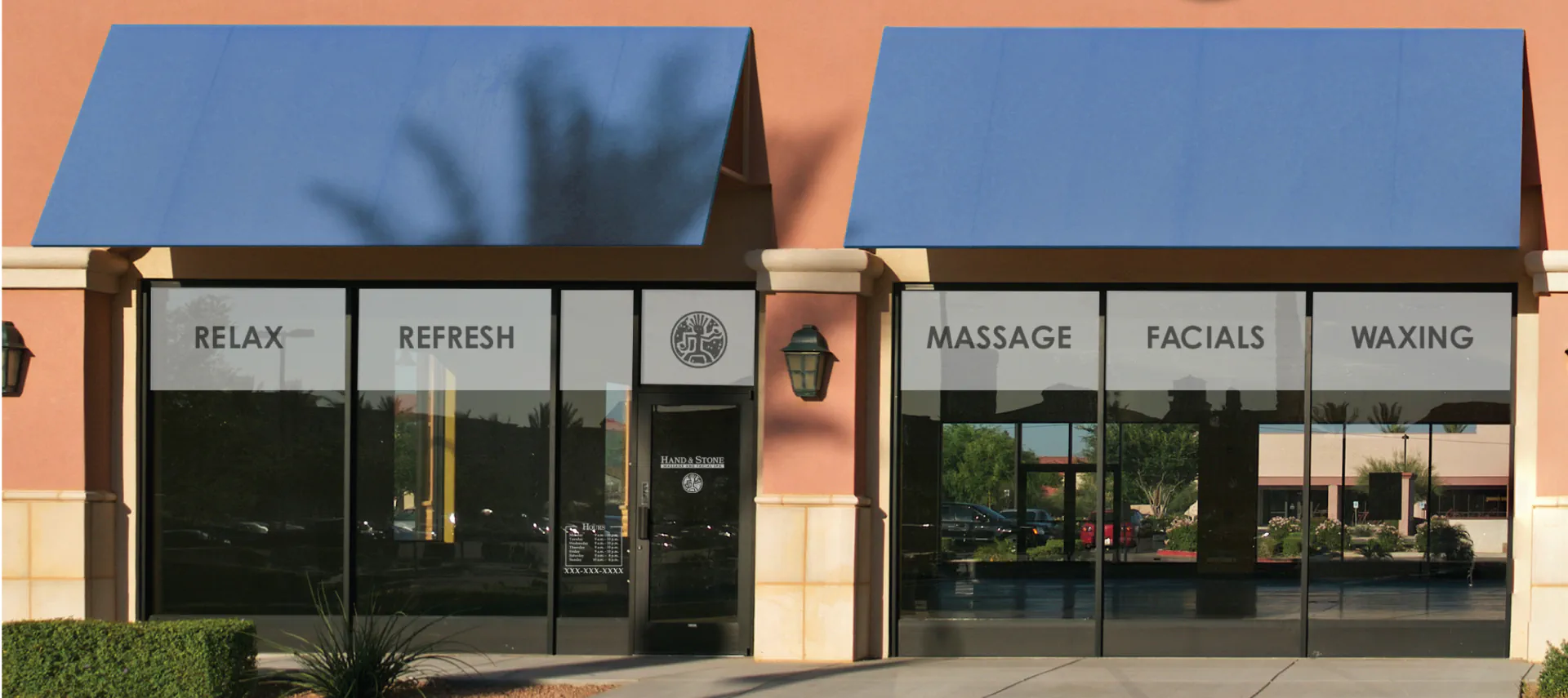 Hand and Stone window branding
