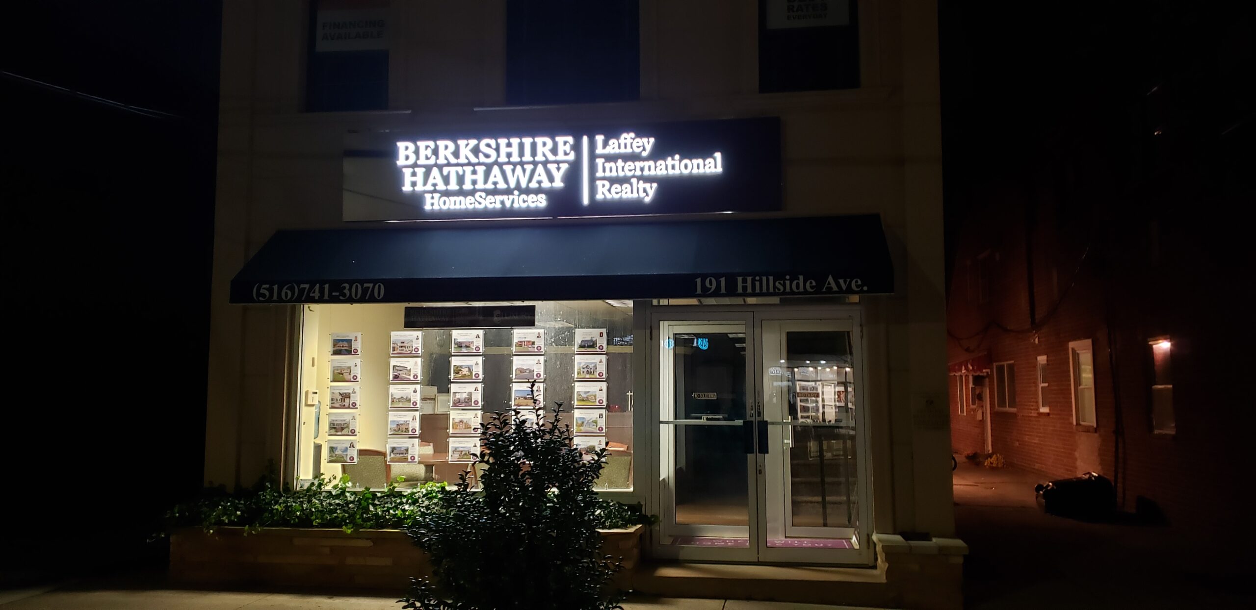 Illuminated sign at night