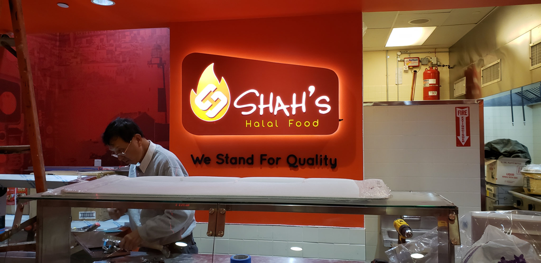 Shah's Halal Food illuminated interior wall sign